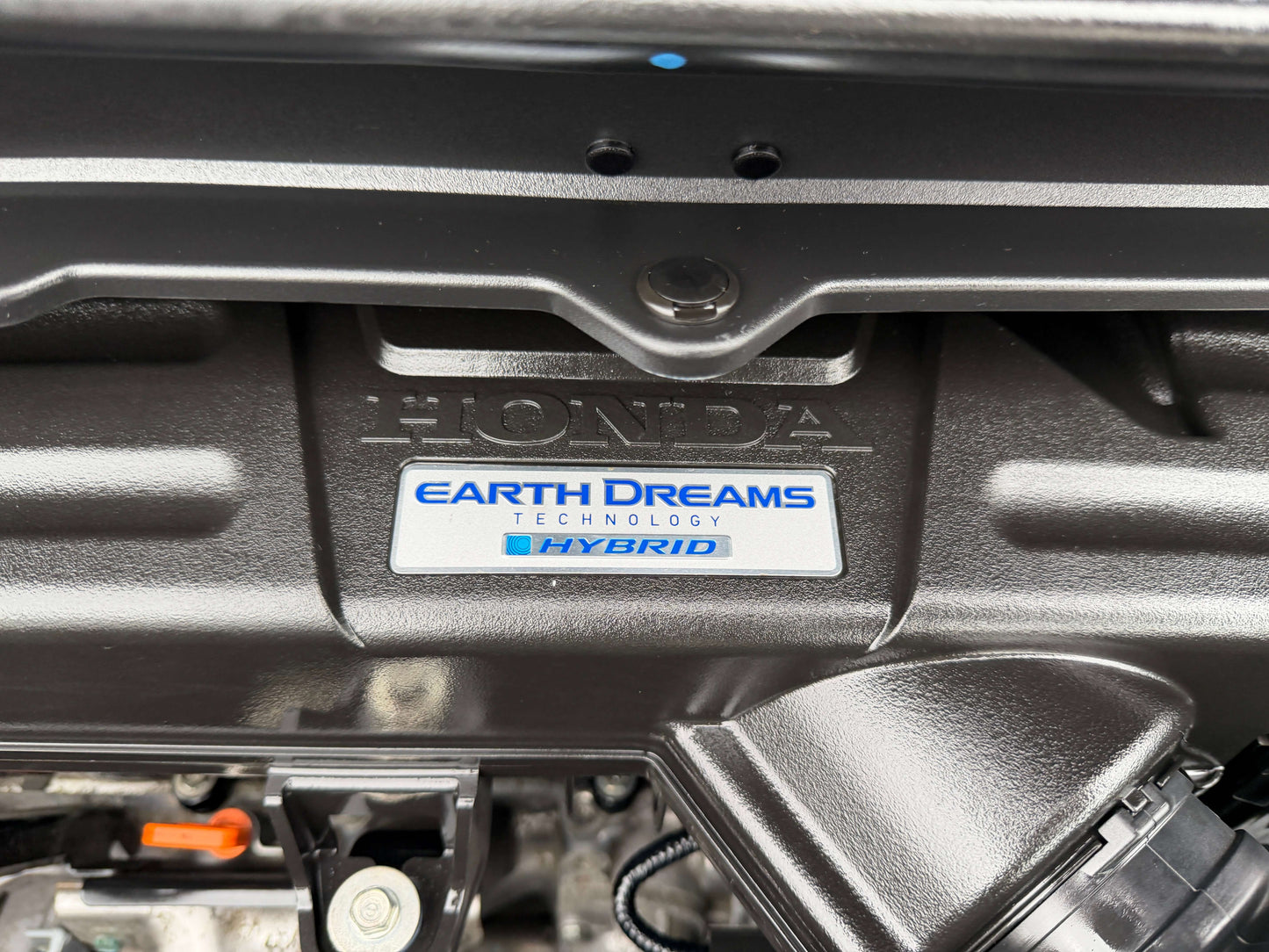 Close-up of the Honda Earth Dreams Technology hybrid engine in the 2018 Honda Honda Stepwgn 2.0 Spada Hybrid.