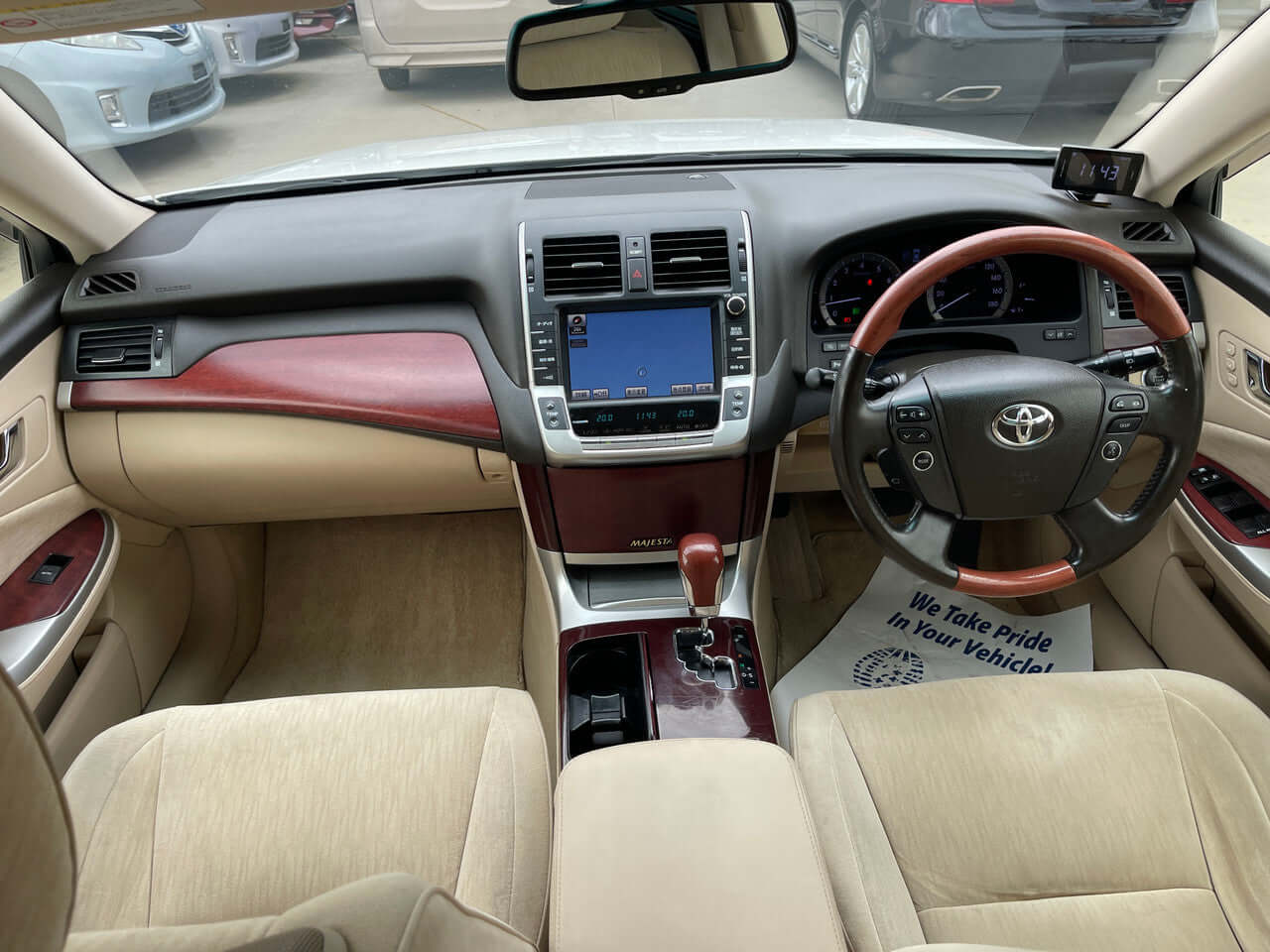 Interior view of a 2012 Toyota Crown Majesta V8 4.6L C Type Luxury Sedan, featuring sleek design and modern technology.