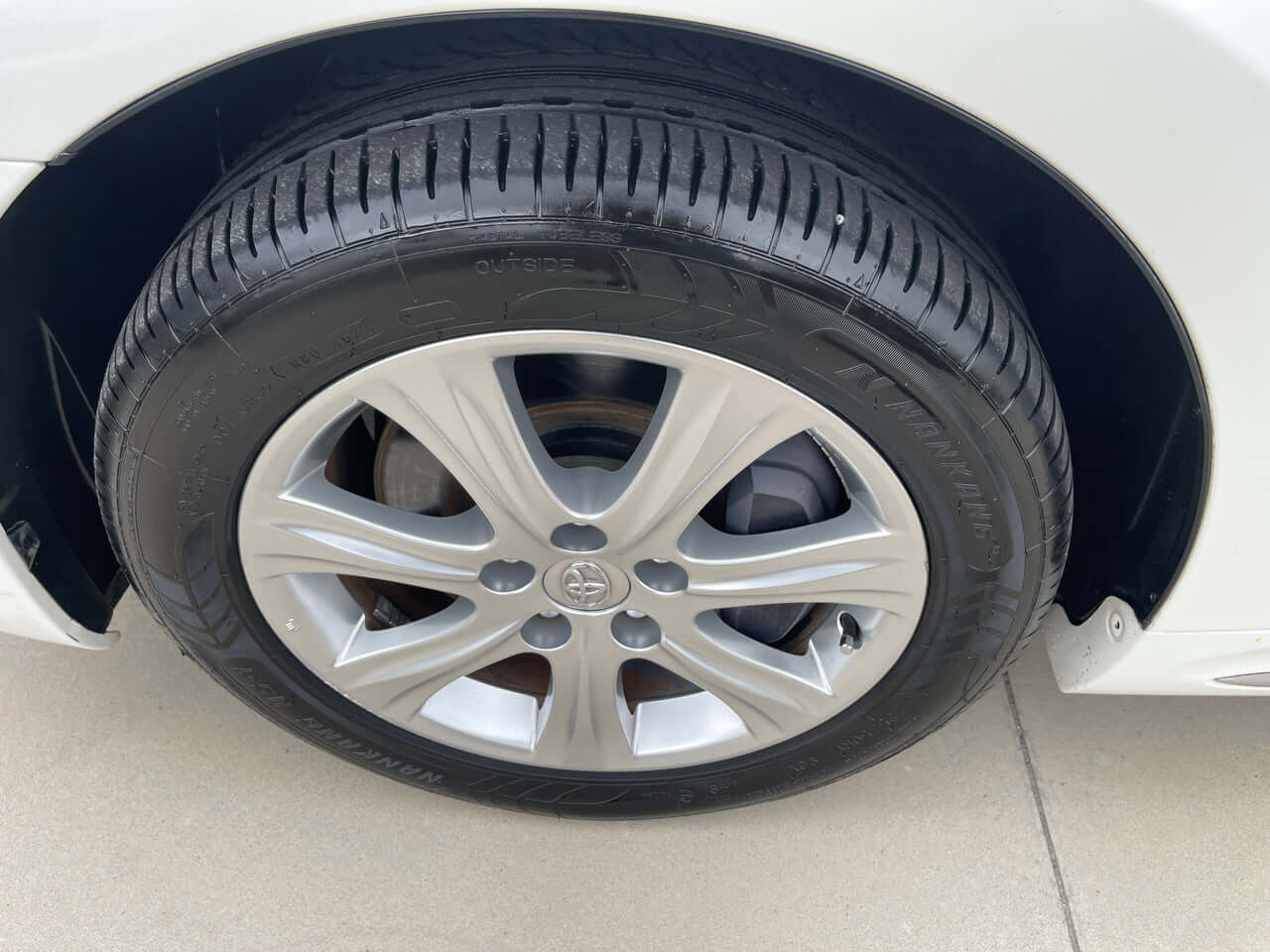 Wheel of a 2012 Toyota Crown Majesta V8 4.6L C Type Luxury Sedan with tire and alloy rim.