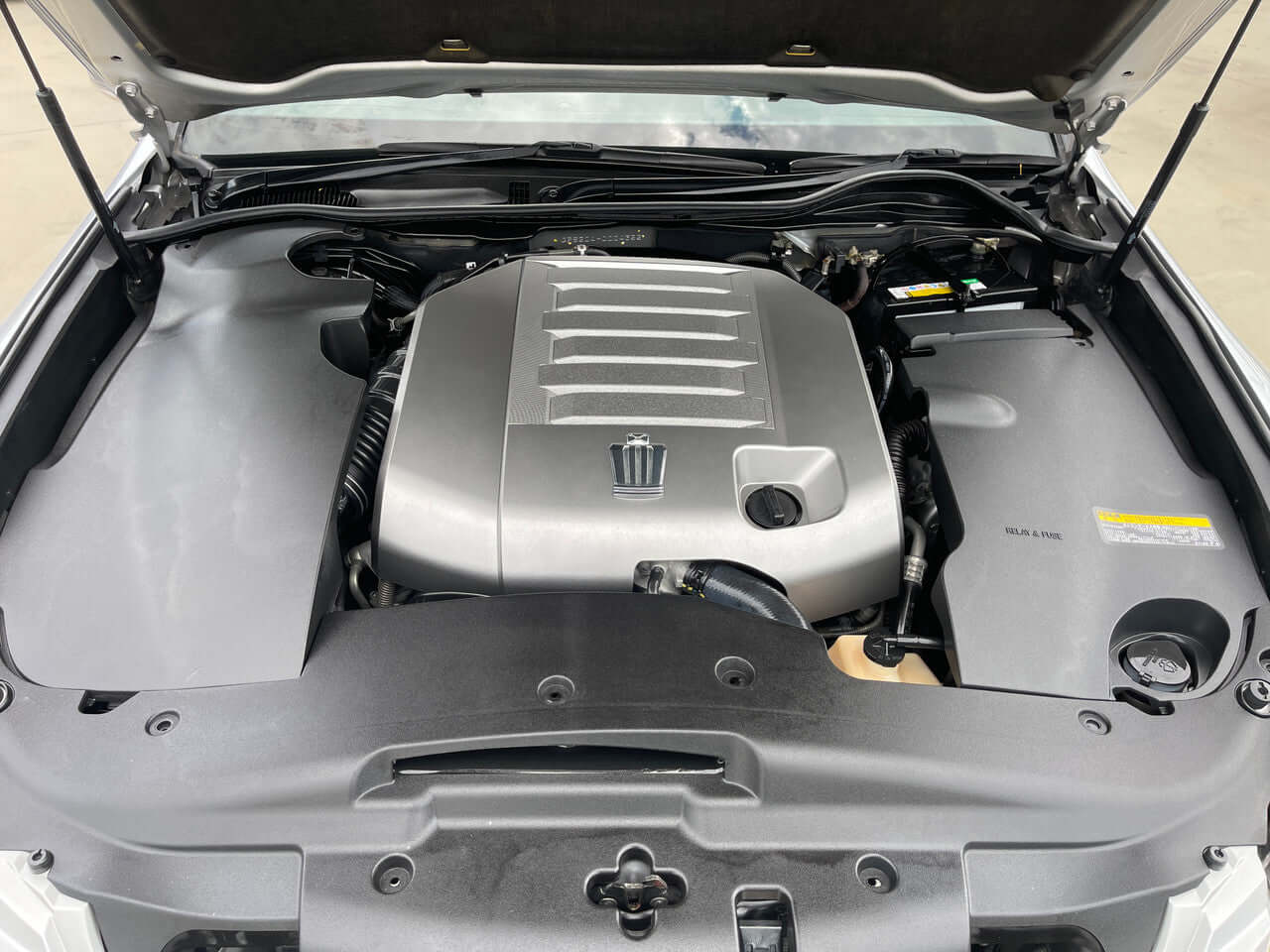 2008 Toyota Crown V6 3.5L engine view under the hood, showcasing the luxury sedan's powerful engine.