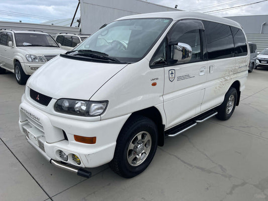 2002 Mitsubishi Delica Space Gear V6 3.0L 4WD Chamonix edition in white, showing exterior design and features.