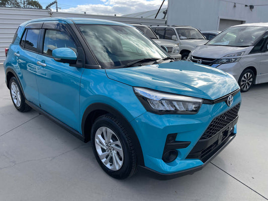 2022 Toyota Raize 1.2L e-Smart Hybrid compact SUV in blue, showcasing its design and features.