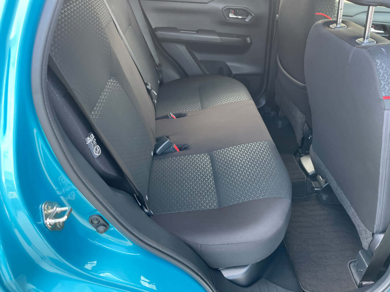 Rear seating area of the 2022 Toyota Raize 1.2L e-Smart Hybrid, showcasing spaciousness and comfort.
