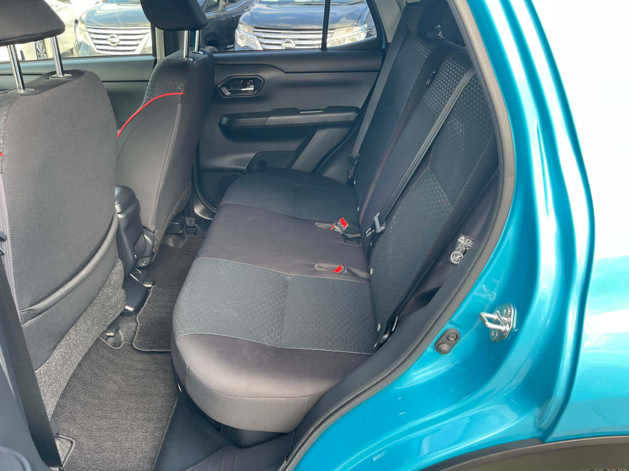 2022 Toyota Raize 1.2L e-Smart Hybrid G interior showing rear seating with spacious room for 5 passengers.