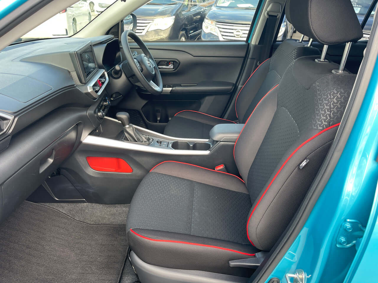 2022 Toyota Raize 1.2L e-Smart Hybrid G interior showing front seats and dashboard.