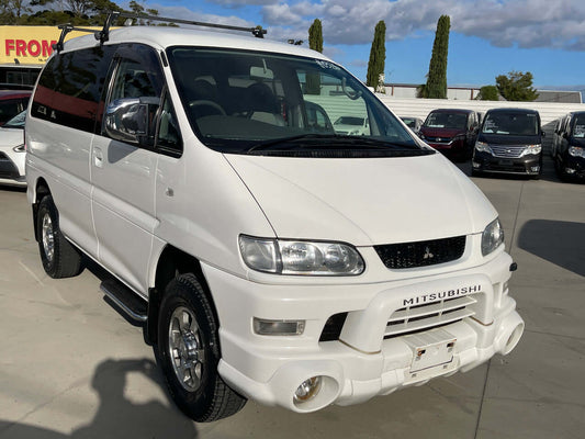 2005 Mitsubishi Delica Space Gear V6 3.0L 4WD Chamonix edition in white, showcasing a clean exterior and design.