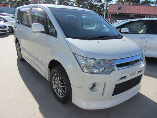 2008 Mitsubishi Delica D5 2.4L 4WD Roadest Edition parked in a lot, showcasing its stylish design and rugged capability.