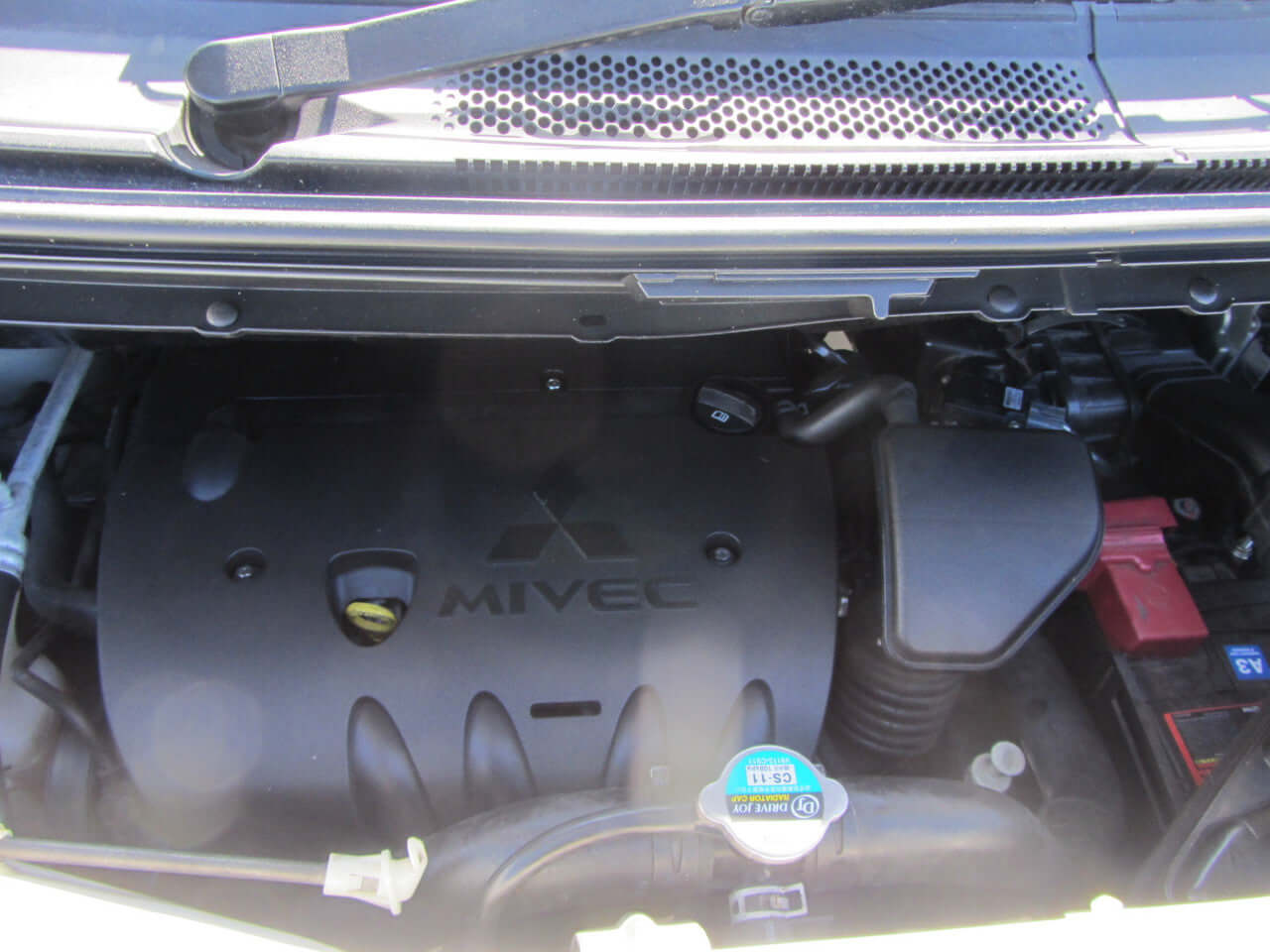 2008 Mitsubishi Delica D5 2.4L 4WD engine compartment showing MIVEC technology for enhanced performance.