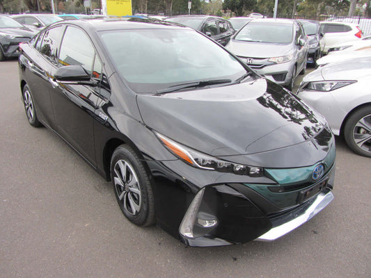 2017 Toyota Prius Prime Plug-In Hybrid 1.8L G-Edition black exterior view, parked among other vehicles.