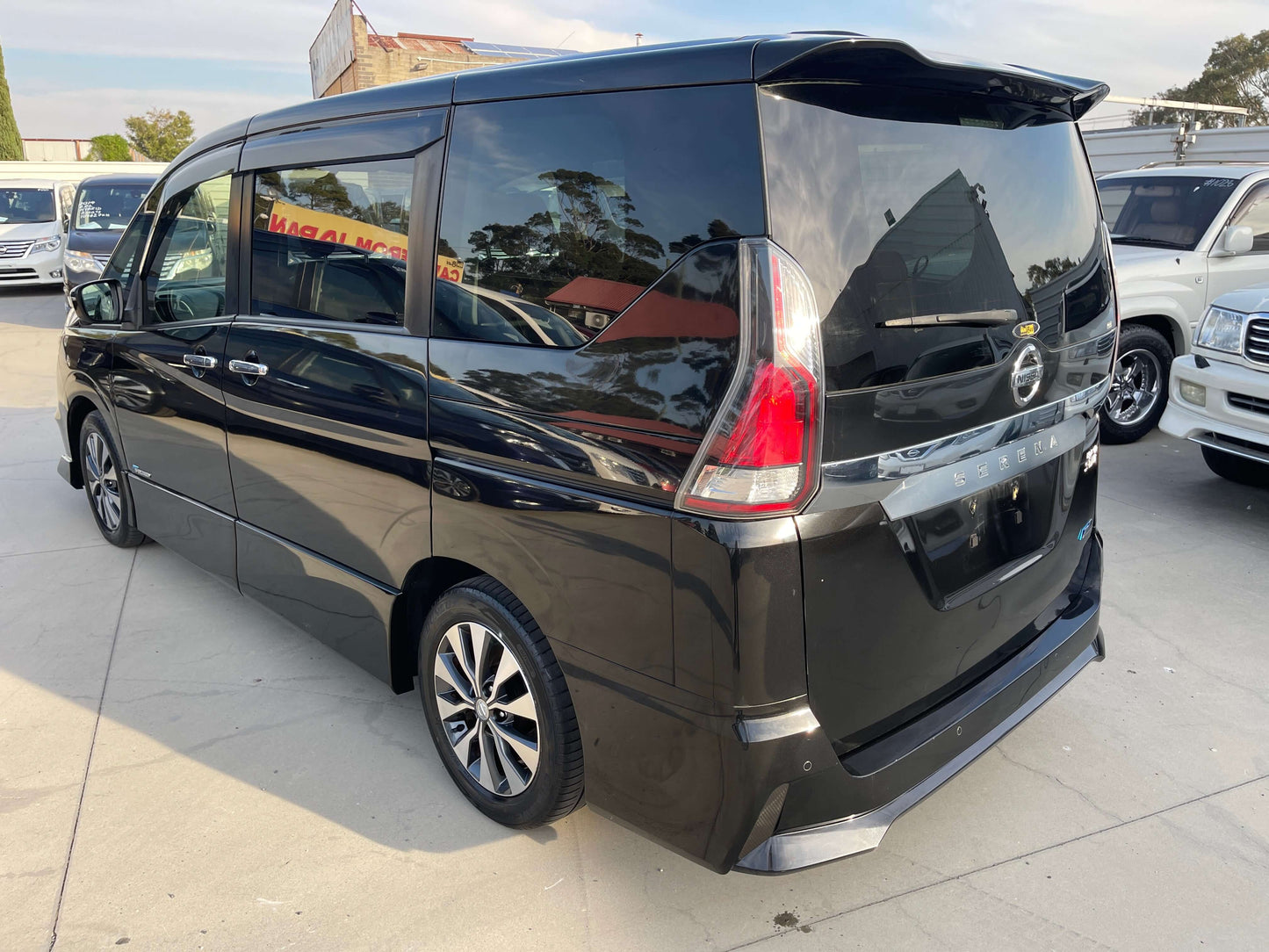 2017 Nissan Serena 2.0L S-Hybrid showcasing a sleek black exterior from a rear angle, highlighting its spacious design.