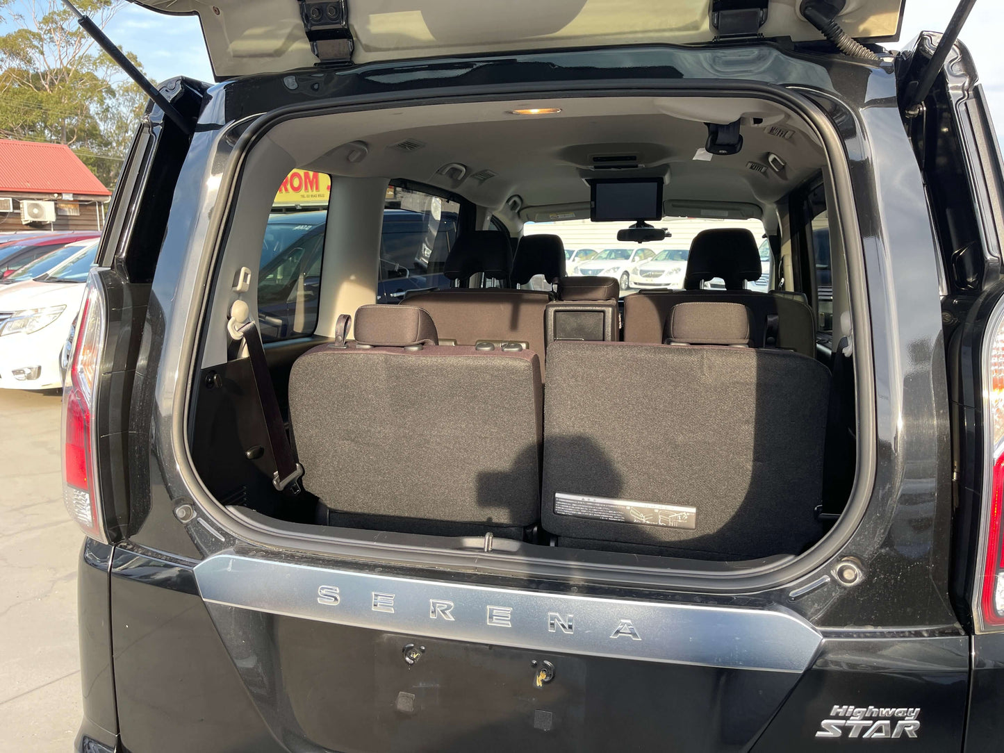 Interior view of the 2017 Nissan Serena 2.0L S-Hybrid showing cargo space and seats.