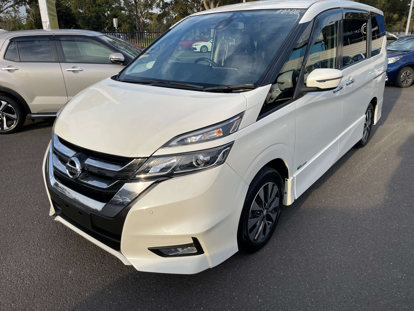 2016 Nissan Serena 2.0L S-Hybrid ProPilot Edition in white parked with other vehicles.