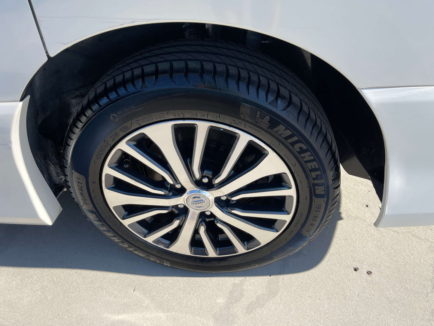 Close-up of a 2015 Nissan Serena 2.0L S-Hybrid Highway Star wheel with Michelin tire.