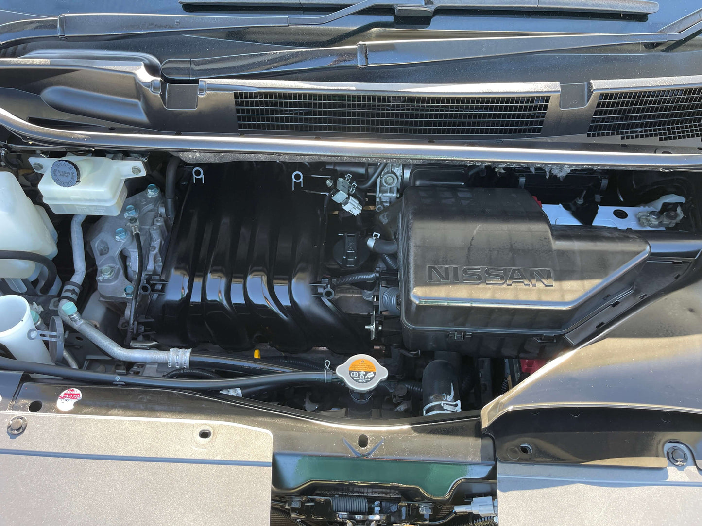 2015 Nissan Serena 2.0L S-Hybrid engine compartment showcasing the powerful engine and components.