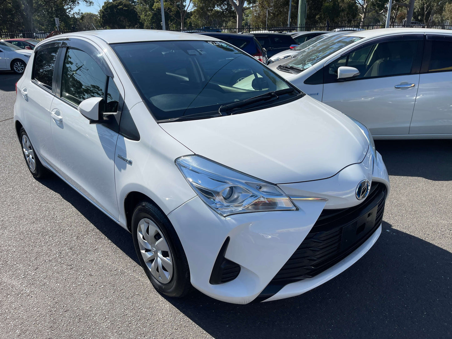 2020 Toyota Vitz 1.5L Hybrid F Safety Edition parked showing sleek design and modern features.