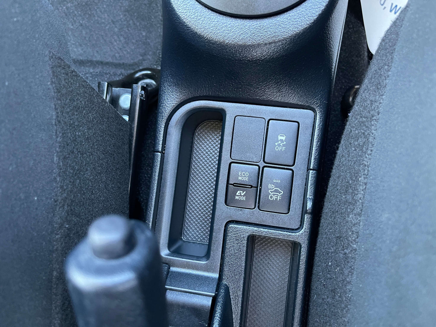 2020 Toyota Vitz 1.5L Hybrid F Safety Edition interior controls featuring Eco, EV, and other function buttons.