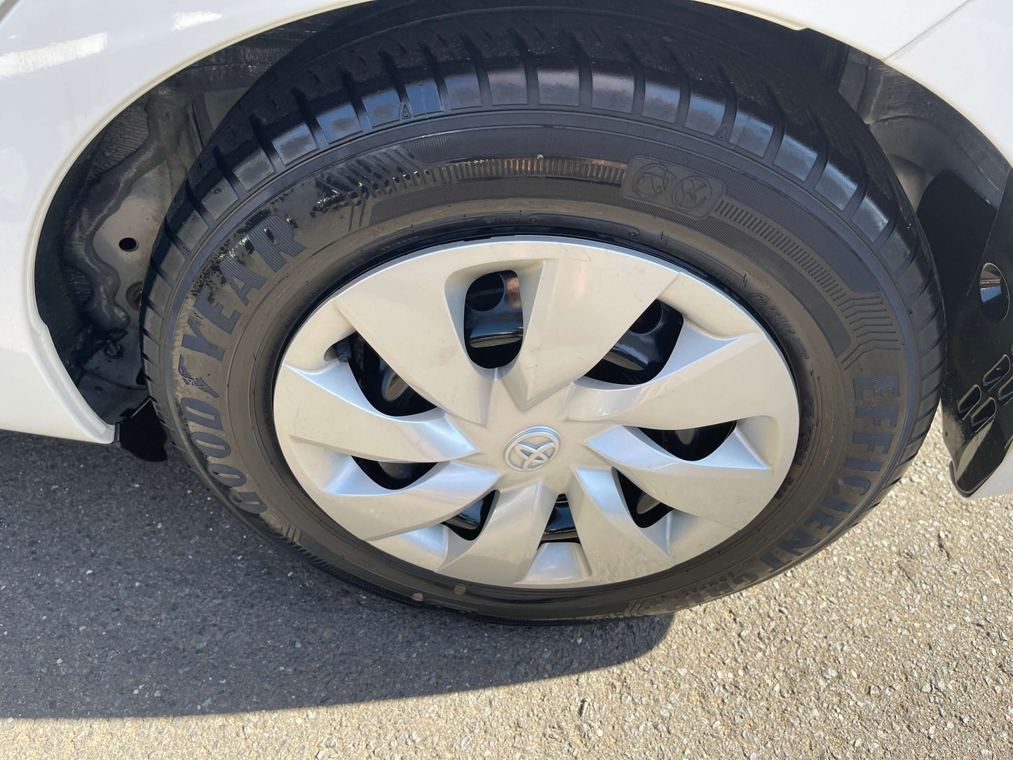 Wheel of a 2020 Toyota Vitz 1.5L Hybrid F Safety Edition showcasing alloy rims and Goodyear tires.