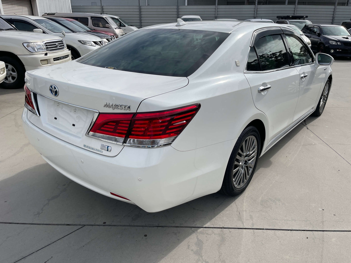 2014 Toyota Crown Majesta V6 3.5L Hybrid Luxury Sedan rear view, showcasing sleek design and premium features.