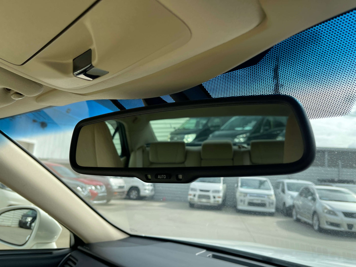 Interior view of rearview mirror in a 2014 Toyota Crown Majesta V6 3.5L Hybrid Luxury Sedan.