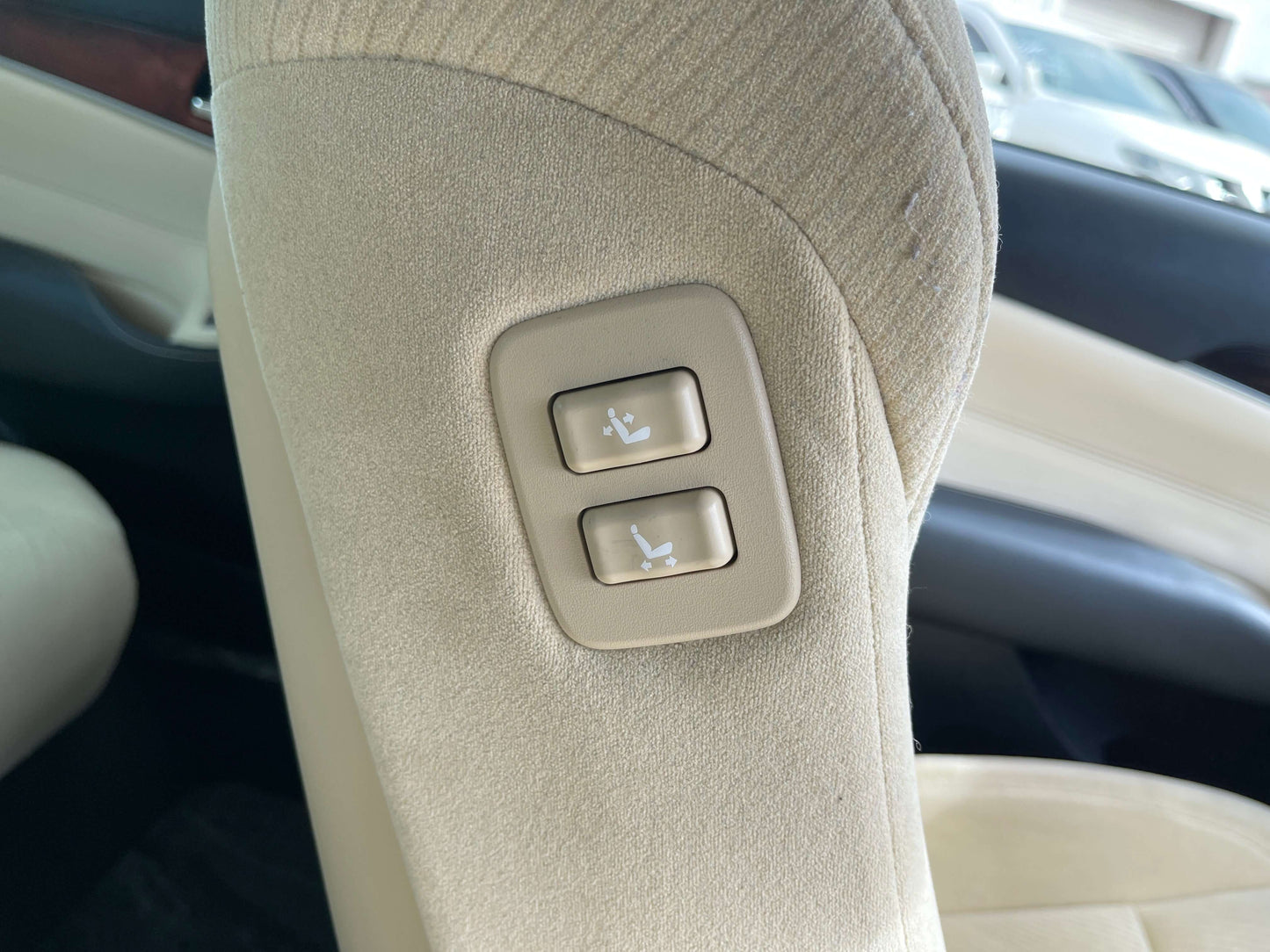 Seat adjustment controls in the 2014 Toyota Crown Majesta V6 3.5L Hybrid Luxury Sedan interior.