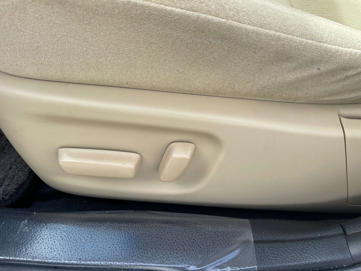 Seat controls in the 2014 Toyota Crown Majesta V6 3.5L Hybrid luxury sedan interior.