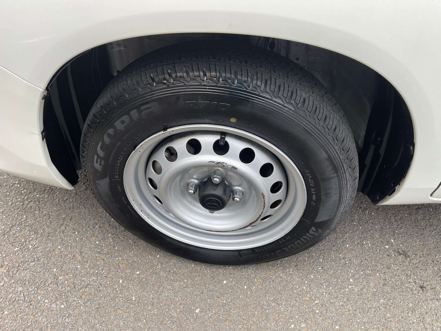 2020 Toyota Probox Hybrid 1.5L Station Wagon tire, close-up view of the wheel and tire details.