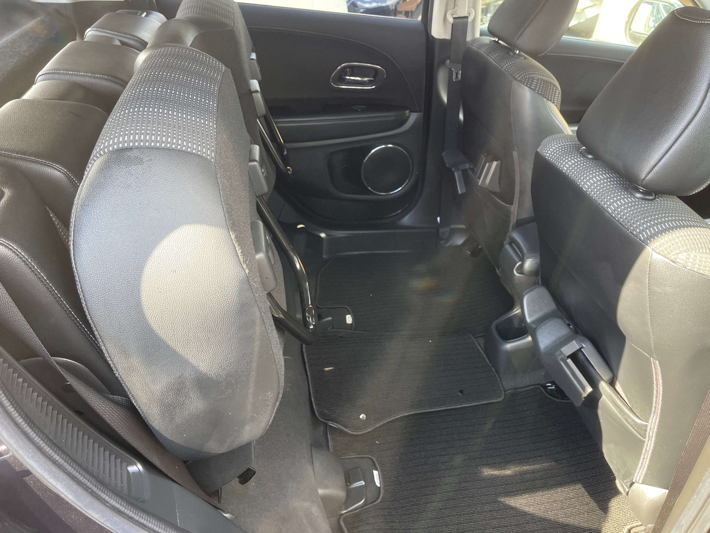 Interior view of the 2014 Honda Vezel HR-V Hybrid Z SUV showcasing comfortable seating for 5 passengers.