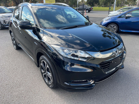 2016 Honda Vezel HR-V Hybrid Z Honda Sensing SUV in black color, 5 seater with stylish design.