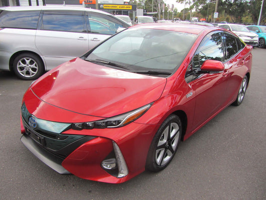 2019 Toyota Prius Prime Plug-In Hybrid 1.8L G-Edition in red color, showcasing a sleek exterior design and modern features.