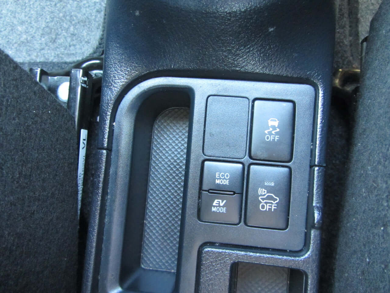 Control buttons from the 2018 Toyota Vitz 1.5L Hybrid including ECO and EV mode.