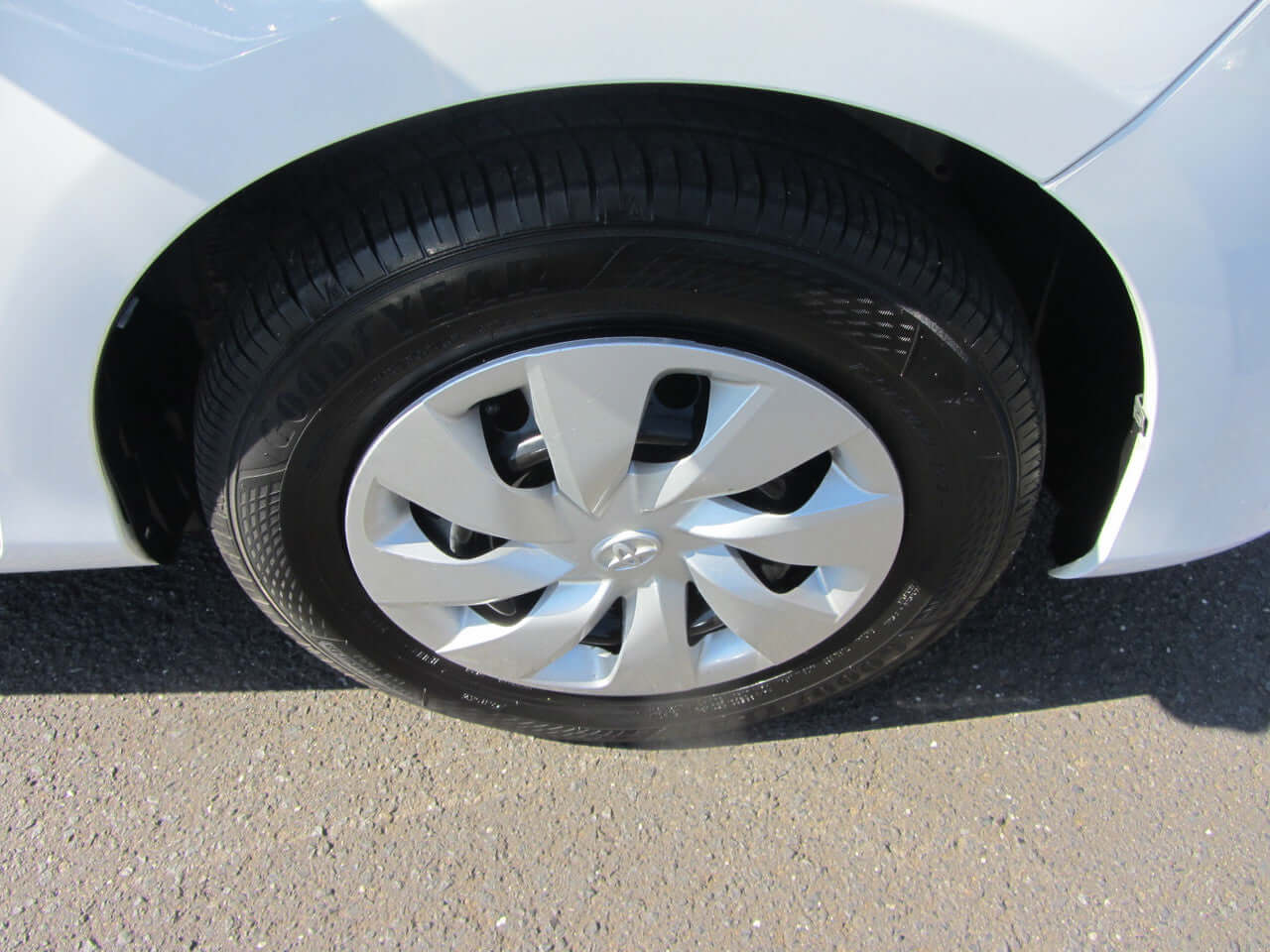 2018 Toyota Vitz 1.5L Hybrid wheel close-up showing alloy design and tire details.