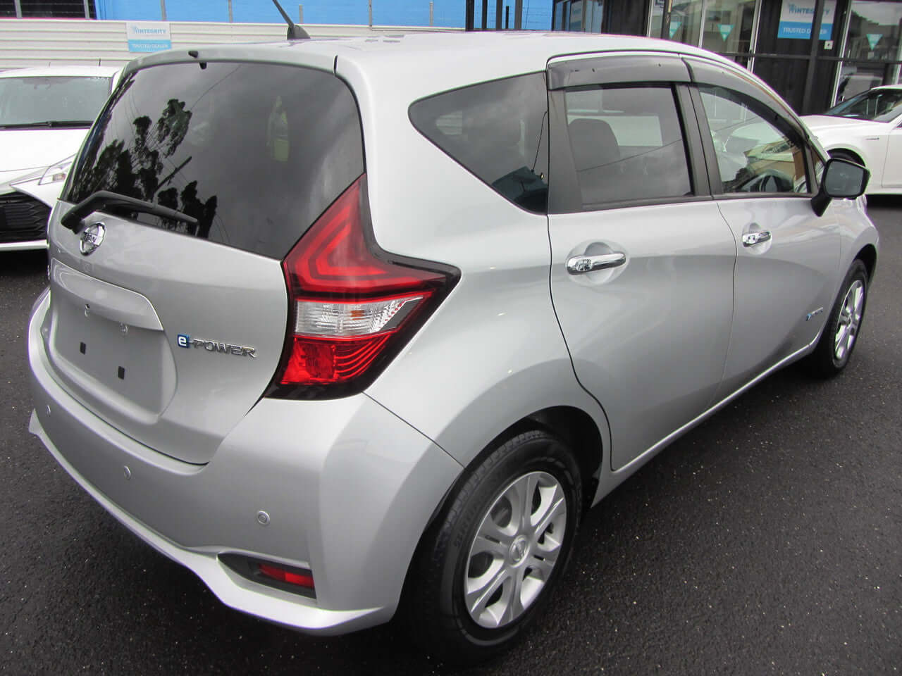 2019 Nissan Note e-Power G Edition Hybrid silver rear view with e-Power badge, showcasing sleek design and modern features.