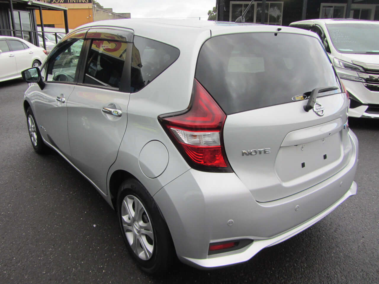 2019 Nissan Note e-Power G Edition silver hatchback rear view, showing sleek design and modern features.