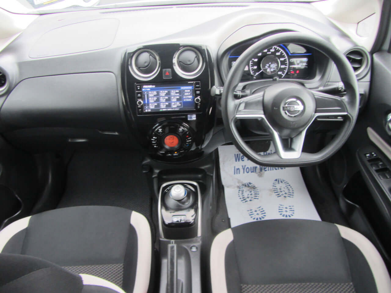 Interior view of the 2019 Nissan Note e-Power showing dashboard and seating.