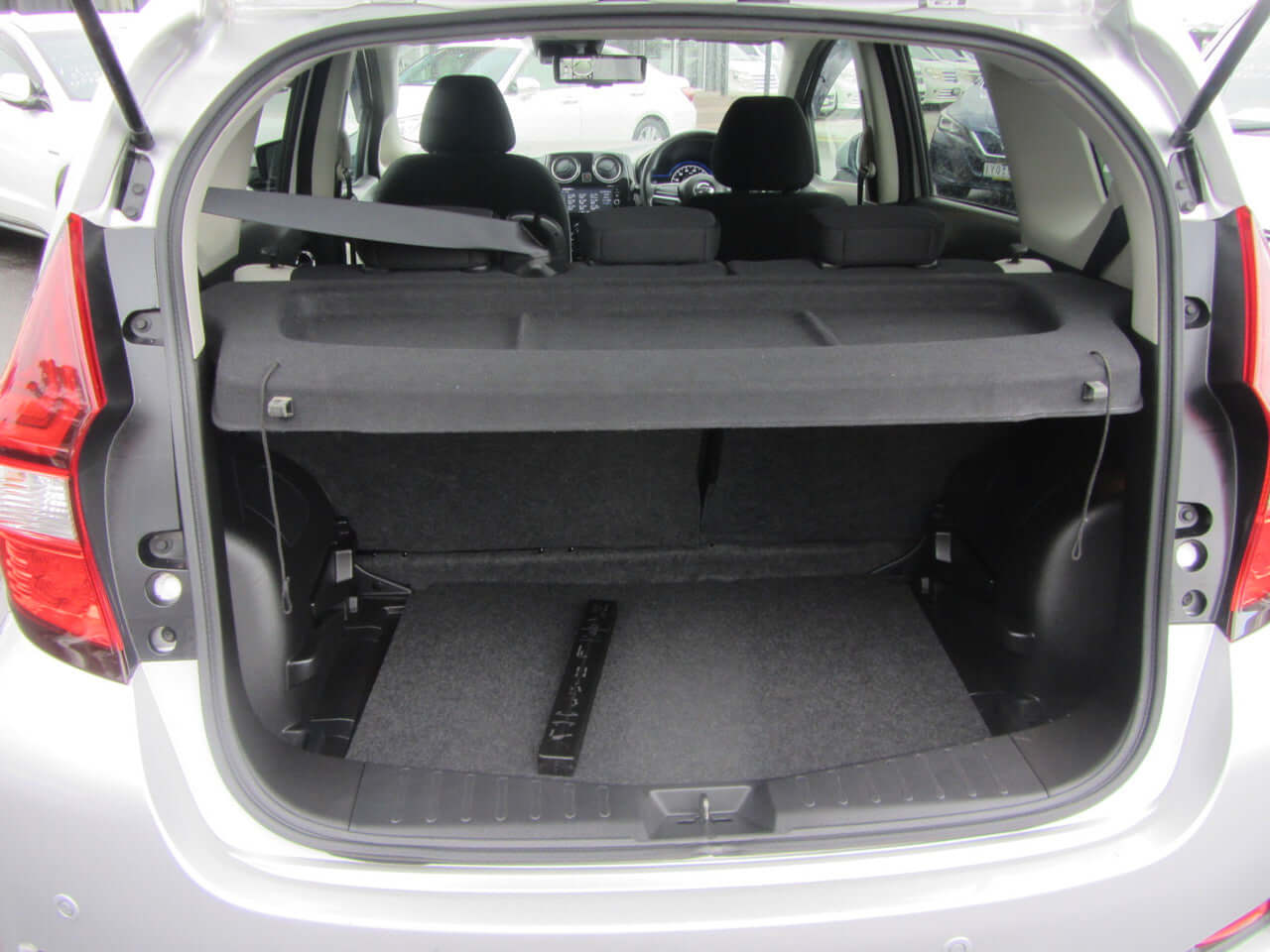 Interior view of the boot space in a 2019 Nissan Note e-Power, showcasing ample storage capacity.