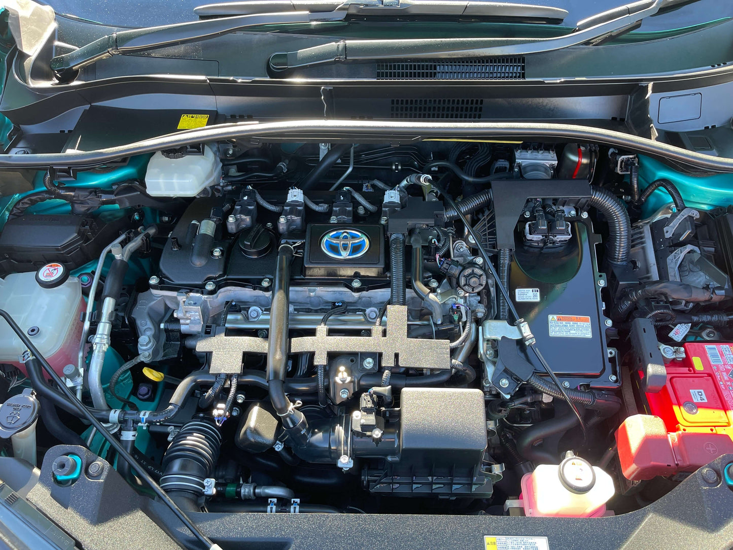 2017 Toyota C-HR 1.8L Hybrid Full Option engine compartment showing hybrid components and design.