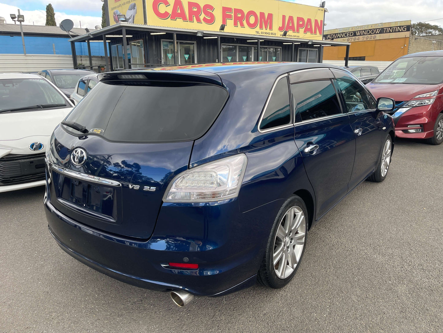 2008 Toyota Mark X Zio V6 3.5L 350G in blue color parked, showcasing rear view and design features.