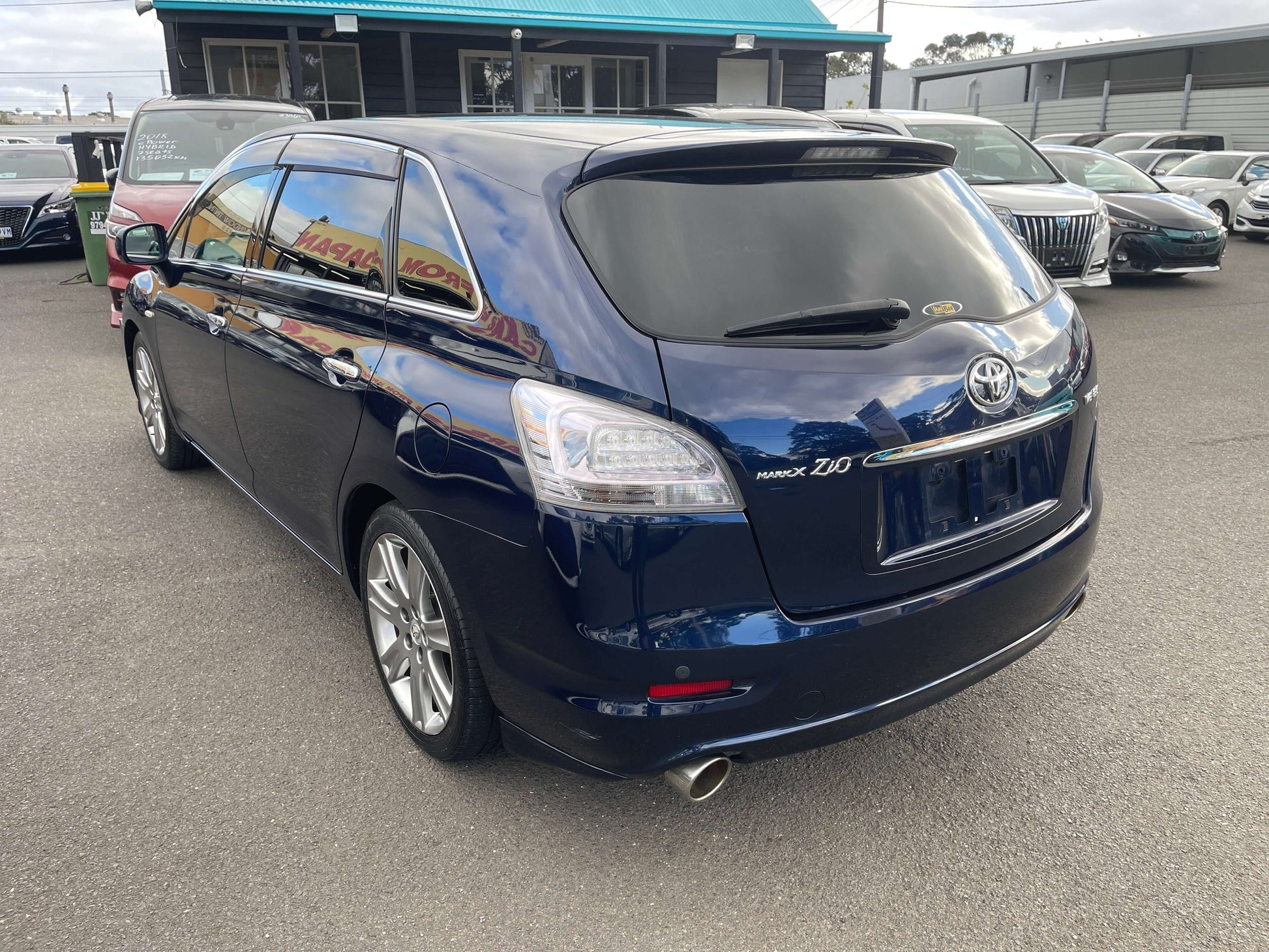 2008 Toyota Mark X Zio V6 3.5L rear view showcasing sleek design and alloy wheels, 6-seater wagon for sale.