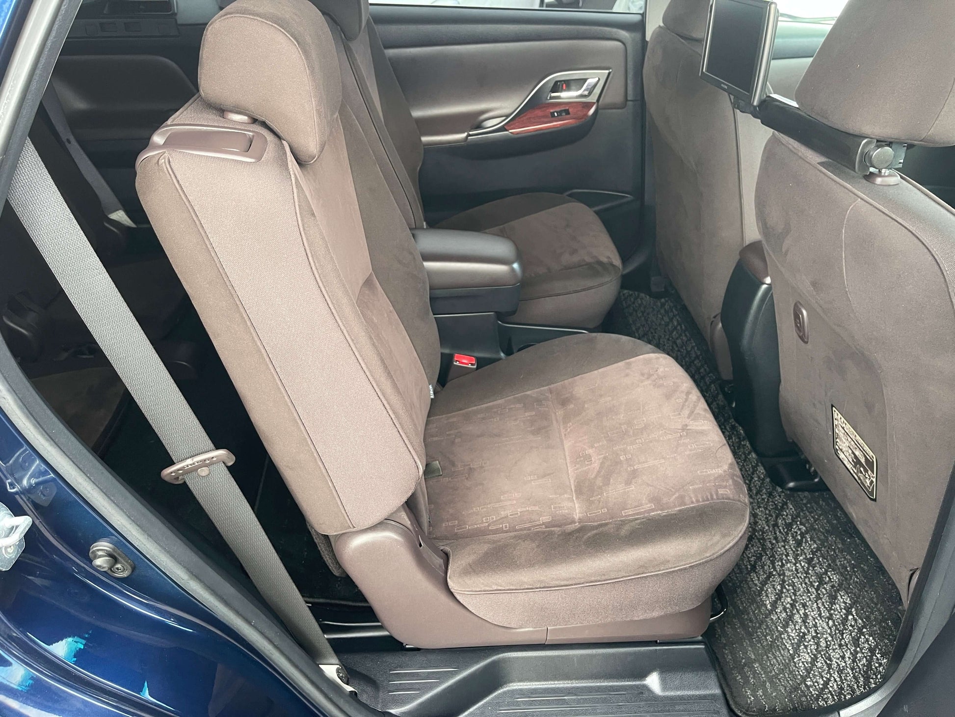 Interior view of the 2008 Toyota Mark X Zio V6 3.5L showing spacious brown upholstery in the back seats.