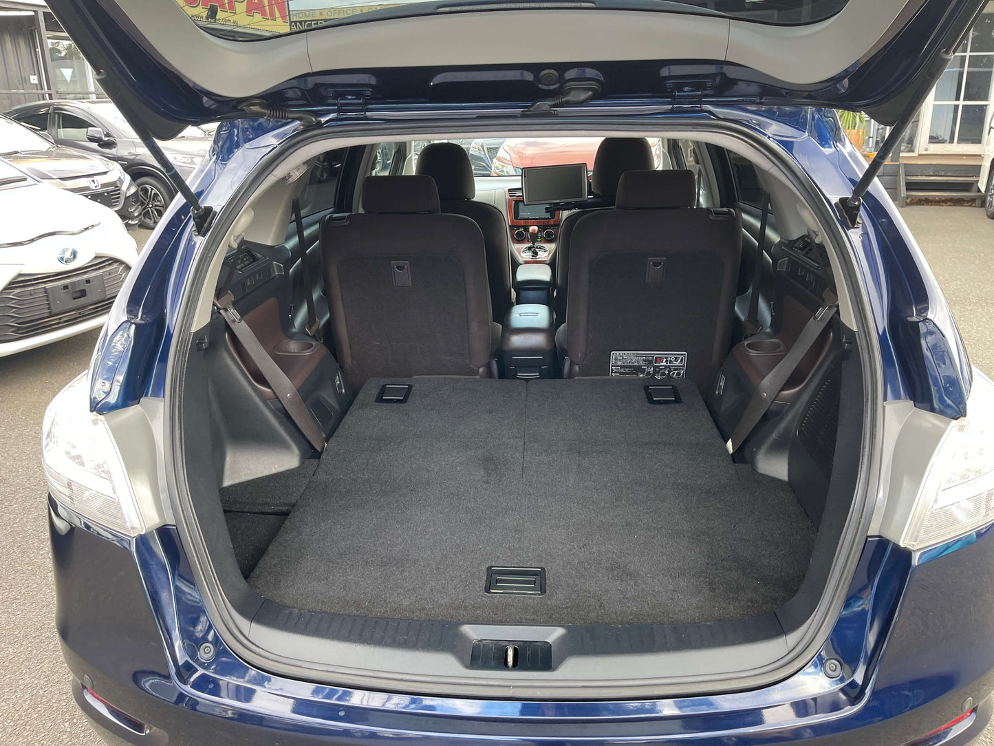 2008 Toyota Mark X Zio V6 3.5L rear interior view showing spacious cargo area and seating for 6.