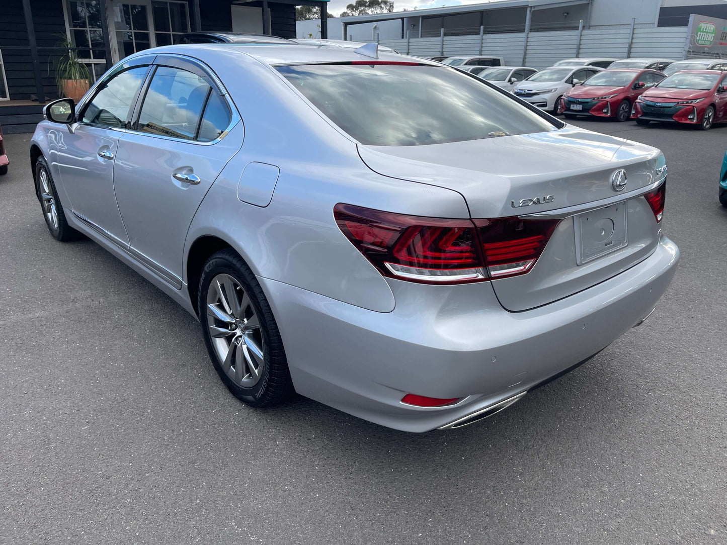 2015 Lexus LS460 AWD V8 4.6L Version L Premium Luxury Sedan parked on display.