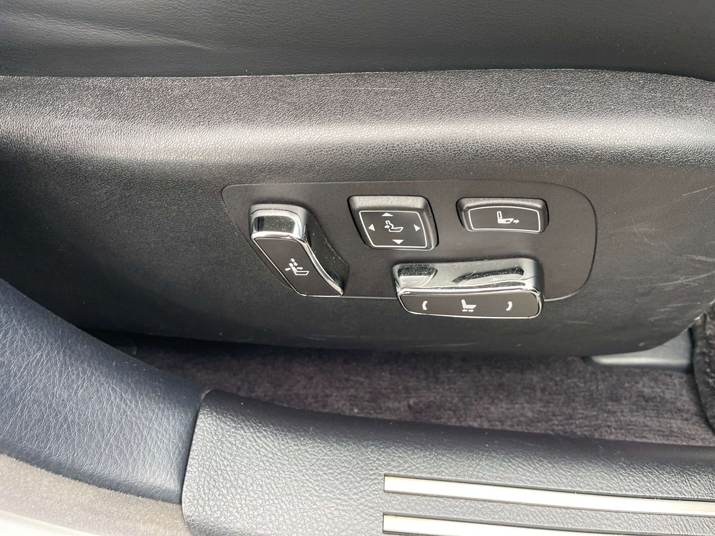Controls for adjustable seats in a 2015 Lexus LS460 AWD V8 4.6L Premium Luxury Sedan.