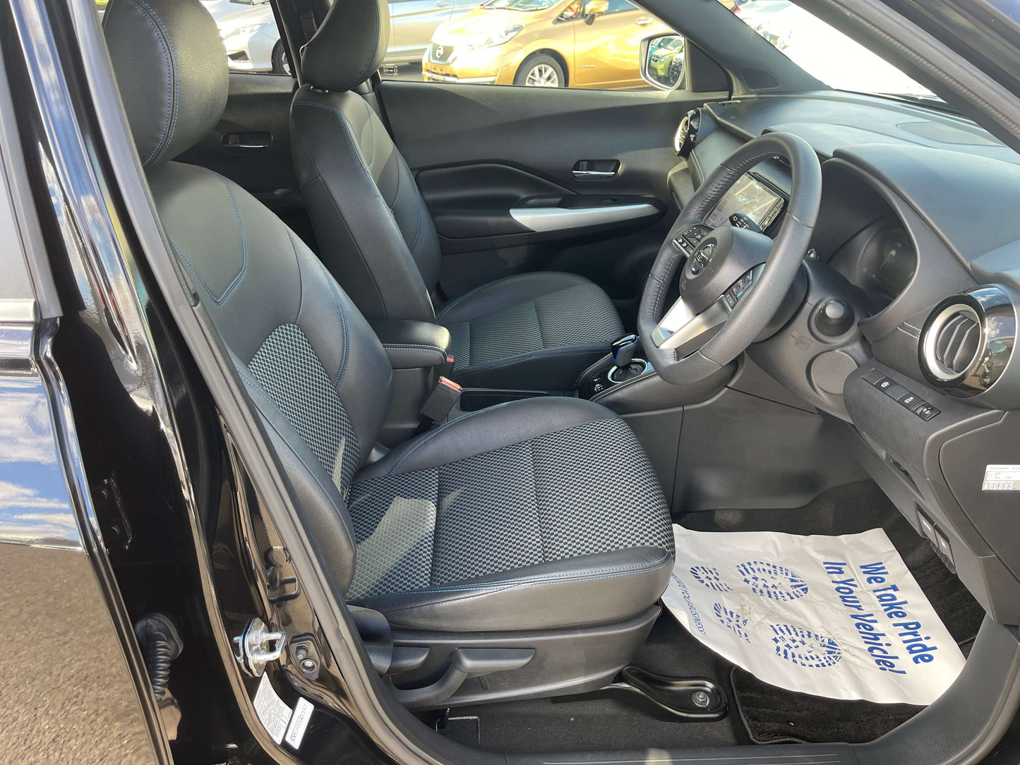 Interior view of 2020 Nissan Kicks e-Power X Edition, featuring comfortable seating and modern dashboard design.