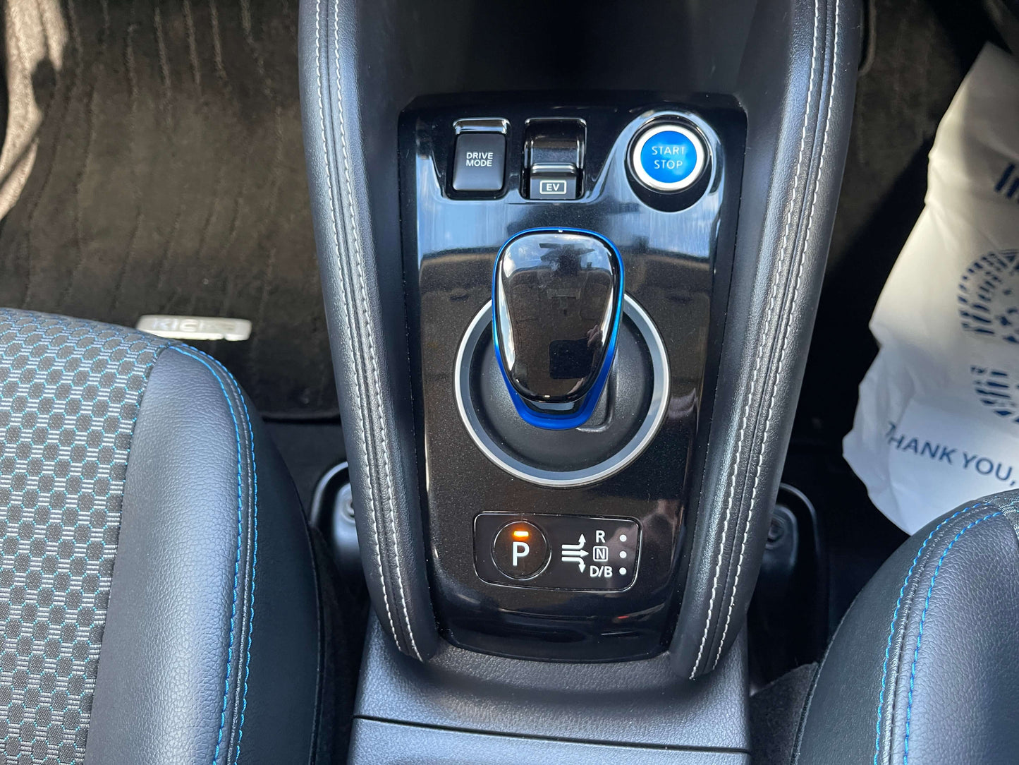 Interior view of 2020 Nissan Kicks e-Power X Edition showing gear shift and start button.