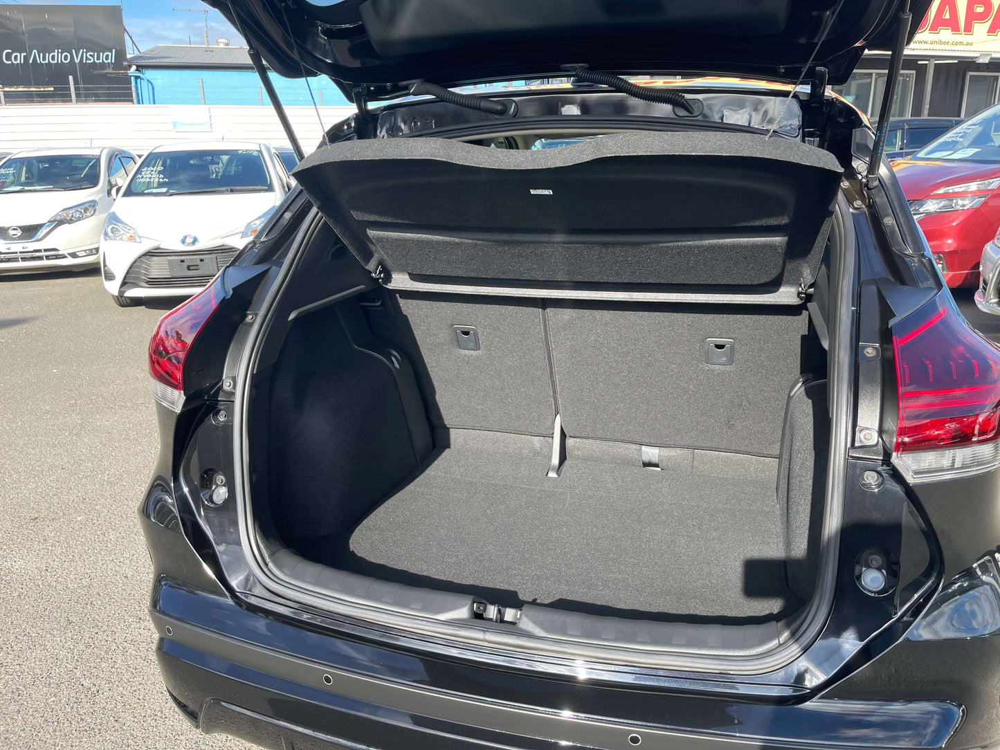 Rear view of the trunk space in a 2020 Nissan Kicks e-Power X Edition showing ample storage capacity.