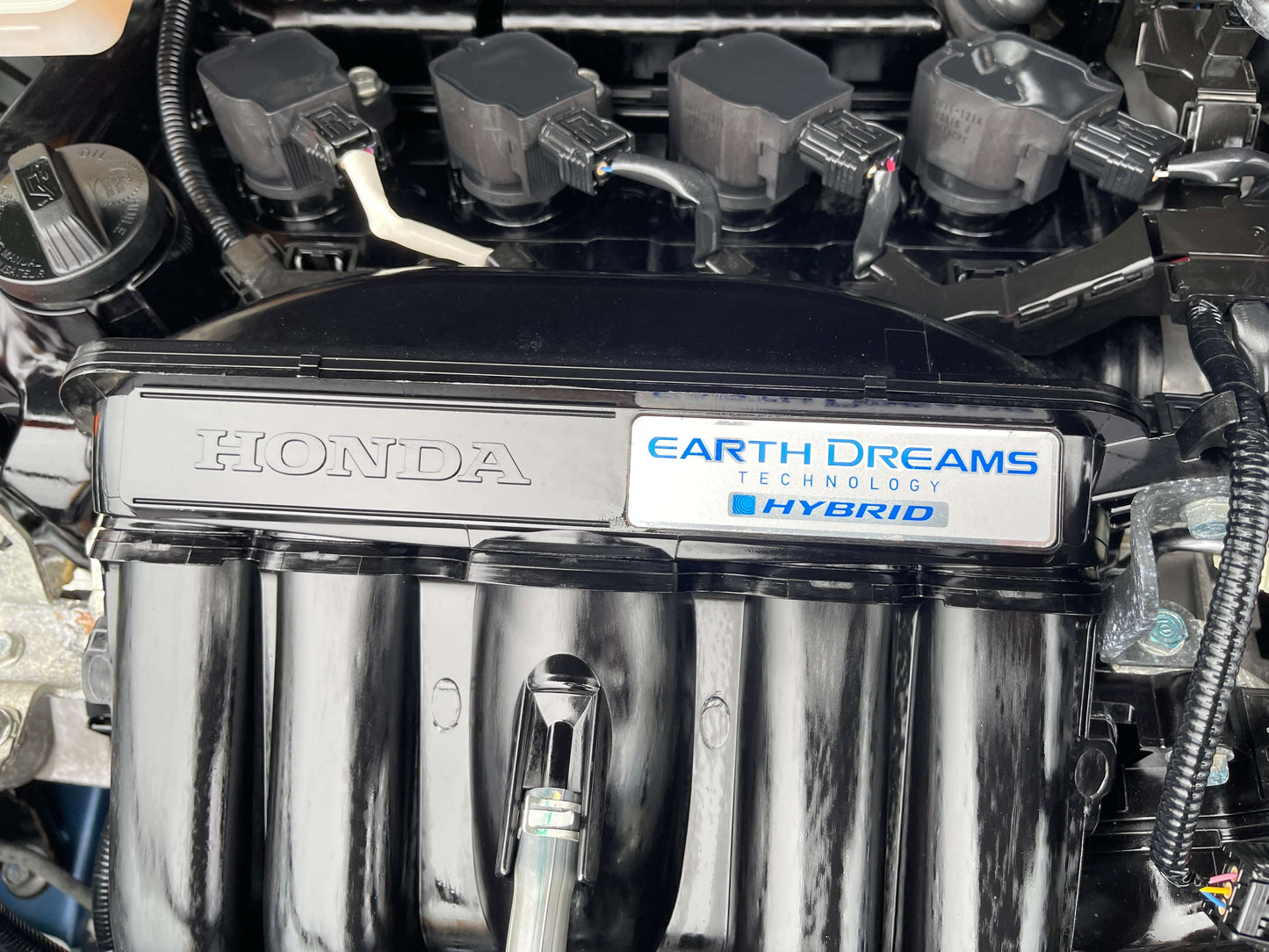 2018 Honda Fit 1.5 Hybrid engine featuring Earth Dreams Technology for fuel efficiency.