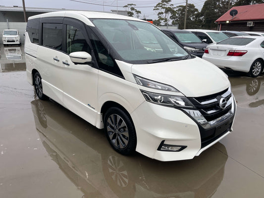 2016 Nissan Serena 2.0L S-Hybrid in white, showcasing sleek design and modern features, parked elegantly.