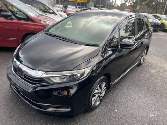 2019 Honda Shuttle Hybrid X Honda Sensing Edition 5 seater, black exterior, front view, showcasing fuel efficiency and style.