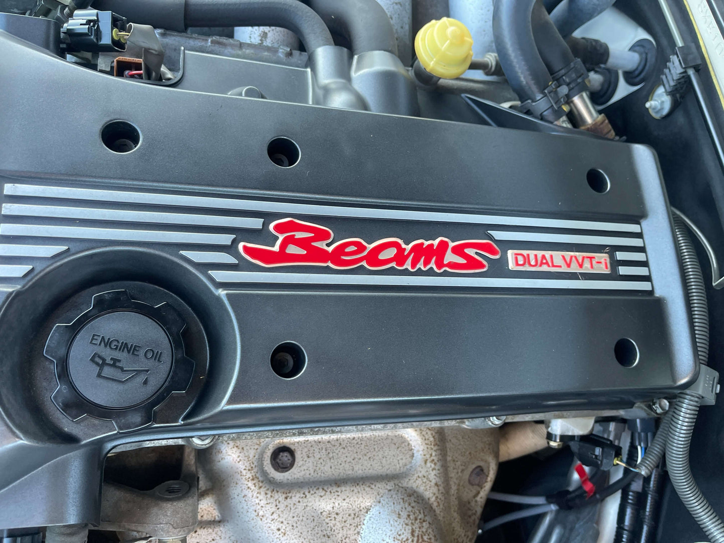 Engine cover of 2003 Toyota Altezza 2.0 RS200 featuring Beams Dual VVT-i logo.
