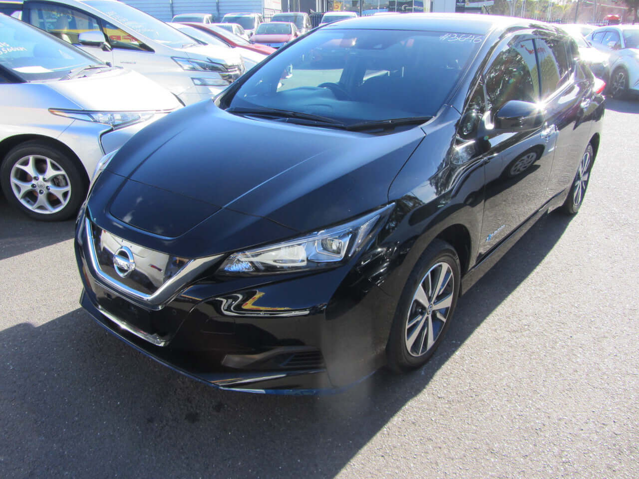 2019 Nissan Leaf e+ 62kW X-Edition Full Electric parked in a lot.